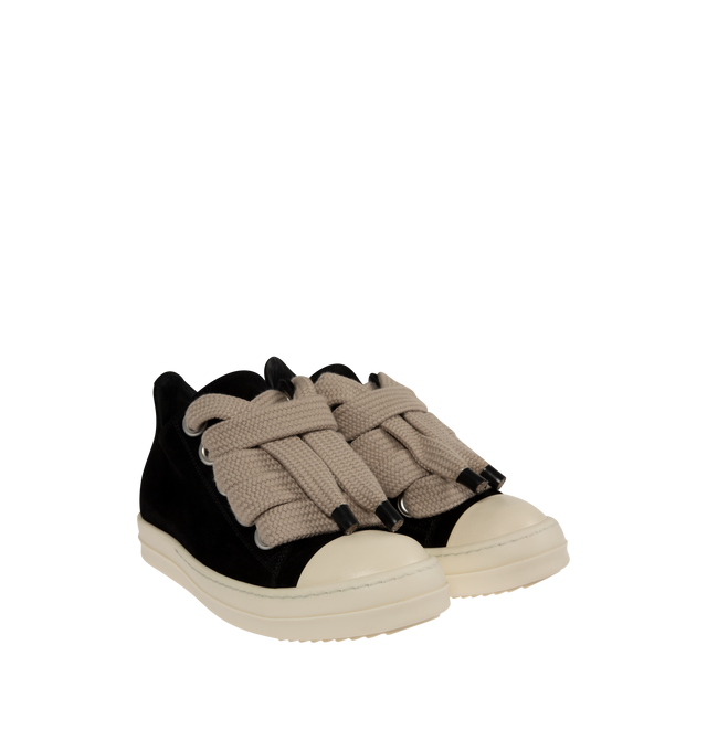 Image 2 of 5 - BLACK - Rick Owens Womens Jumbo Lace Low Sneakers are crafted from suede leather. Feature a low-top silhouette, oversized lace-up closure, calf leather toe cap, padded collar, shark-tooth thermoplastic rubber outsole, and signature bumper sole. Upper: 100% Suede Leather; Toe: 100% Calf Leather; Lining: 100% Calf Leather; Insole: 100% Calf Leather; Outsole: 100% Thermoplastic Rubber. Sole Height: 3.5 cm. Made in Italy. 