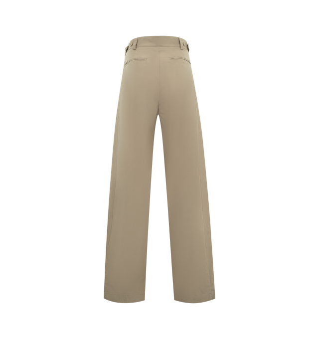 Image 2 of 3 - BROWN - THE ROW Iven Pant featuring tailored low-rise pant in softly crinkled technical silk with barrel leg, front double pleats, adjustable back button tabs, and side welt pockets. 65% silk, 35% nylon. Made in Italy.