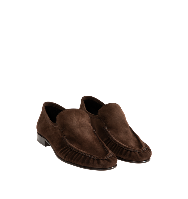 Image 2 of 4 - BROWN - THE ROW Soft Moccasin Two featuring moccasin loafer in soft calfskin suede with oval toe, topstitched front detailing with natural pleating effect and stacked leather heel. 100% calfskin suede. Lined in 100% goatskin leather. Calfskin leather sole. Made in Italy.
