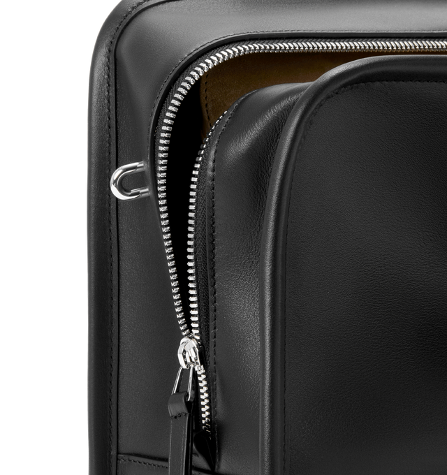 Image 16 of 16 - BLACK - Loewe Amazona 180 large bag takes on a relaxed silhouette anchored by a single toron top handle. It is designed to be carried open, while a concealed closure secures the main compartment. Removable shoulder and crossbody straps make it highly versatile. This large version is crafted in soft calfskin. Three carry options: short handle, removable shoulder strap and crossbody. Features zip closure with two leather zip pullers, two compartments, main compartment closed with magnetic clo