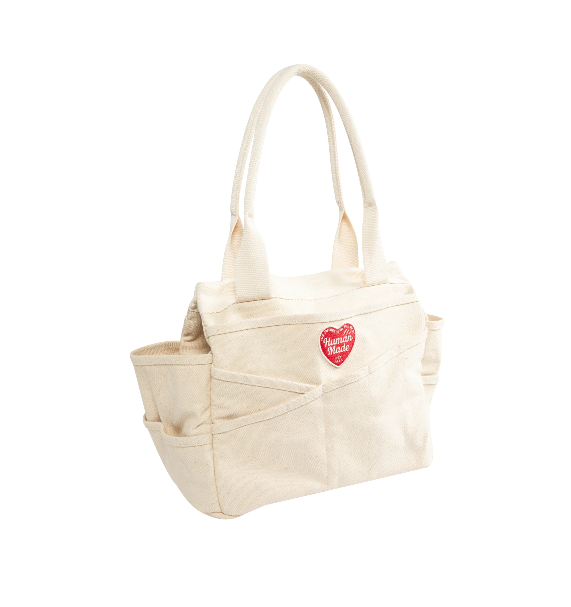 Image 2 of 3 - NEUTRAL - Human Made Tool Bag is crafted from durable 20oz cotton canvas and features a tote-style silhouette with multiple diagonally cut utility pockets for everyday organization. Designed with pigment-printed graphics, a signature heart patch, side snap buttons for adjusting the gusset, and spacious A4-sized storage capacity. Main Material: 100% Cotton. Dimensions: 25 cm H  31 cm W  19 cm D. Fits: notebooks, tablet, water bottle, wallet, phone, and daily essentials.  