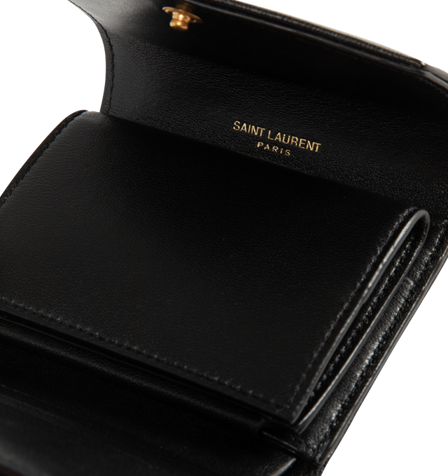 Image 3 of 3 - BLACK - SAINT LAURENT Multi Fold Wallet featuring chevron quilted overstitching, cassandre logo, leather lining, gold-toned hardware, snap-button closure, five card slots, one coin pocket, one bill compartment and one receipt compartment. 4.1 x 3.5 x 1.2 inches. Lambskin. Made in Italy.