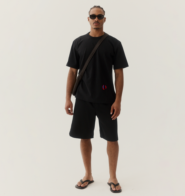 Image 2 of 5 - BLACK - BOTTEGA VENETA Sampieri Thong featuring rubber thong sandal with leather insole. Lining: lambskin. Rubber-injected leather outsole. Thermoplastic polyurethane. Made in Italy.