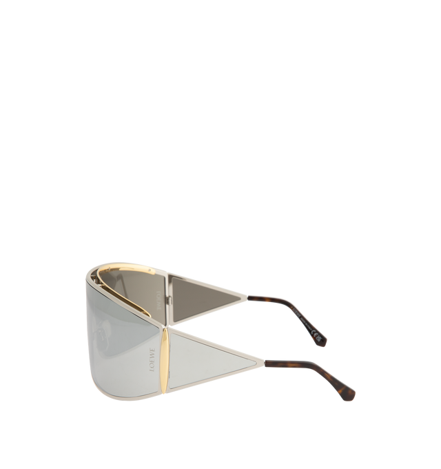 Image 2 of 3 - SILVER - LOEWE Speed Shield Sunglasses featuring shield-shape in a wraparound metal construction with a lens that extends into a distinctive triangle-shaped temple, complemented by contrast trim, universal fit, UVA/UVB protection and engraved LOEWE. Metal. Temple size: 12 cm. Made in Italy.