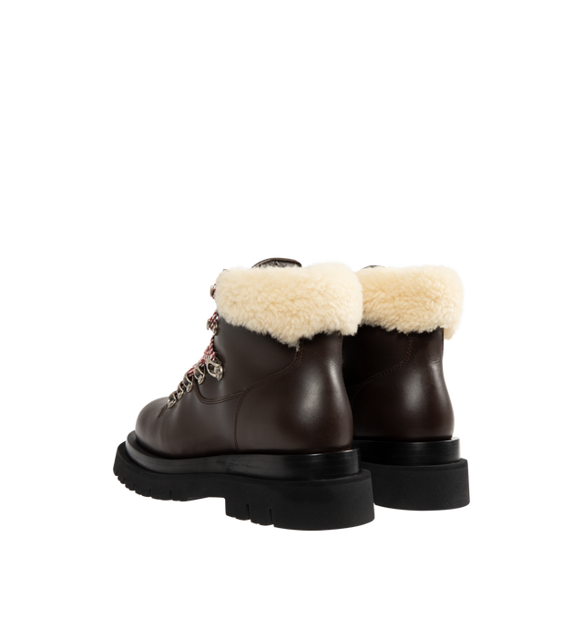 Image 3 of 4 - BROWN - BOTTEGA VENETA Lug Hiking Ankle Boot featuring lace-up hiking ankle boot crafted from calfskin leather, a merino shearling collar and micro rubber outsole. Calfskin, lambskin. Made in Italy.