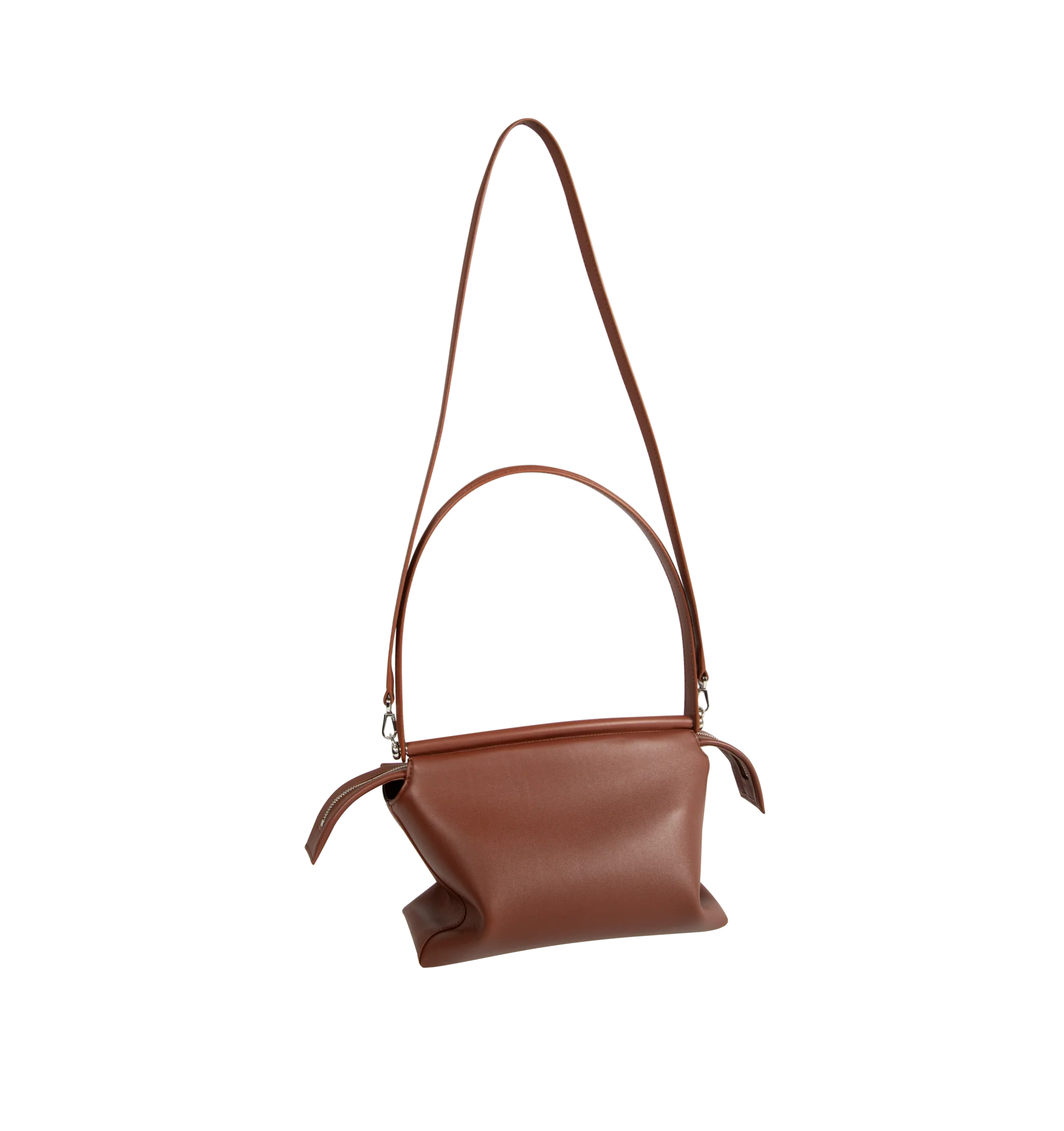 Image 2 of 3 - BROWN - Loewe Small Whisker Bag is crafted from black glazed calfskin and features a slouchy silhouette with a structured handle and oversized zip opening. Designed for shoulder, crossbody, or hand carry, it includes a detachable strap with rotating dog clips, articulated zipper pulls, foldable D-rings, an exterior flat pocket, and an interior flat pocket. Gold-tone hardware and embossed Loewe and Double L branding complete the design. Fits a large phone, small wallet, sunglasses, and keys. M