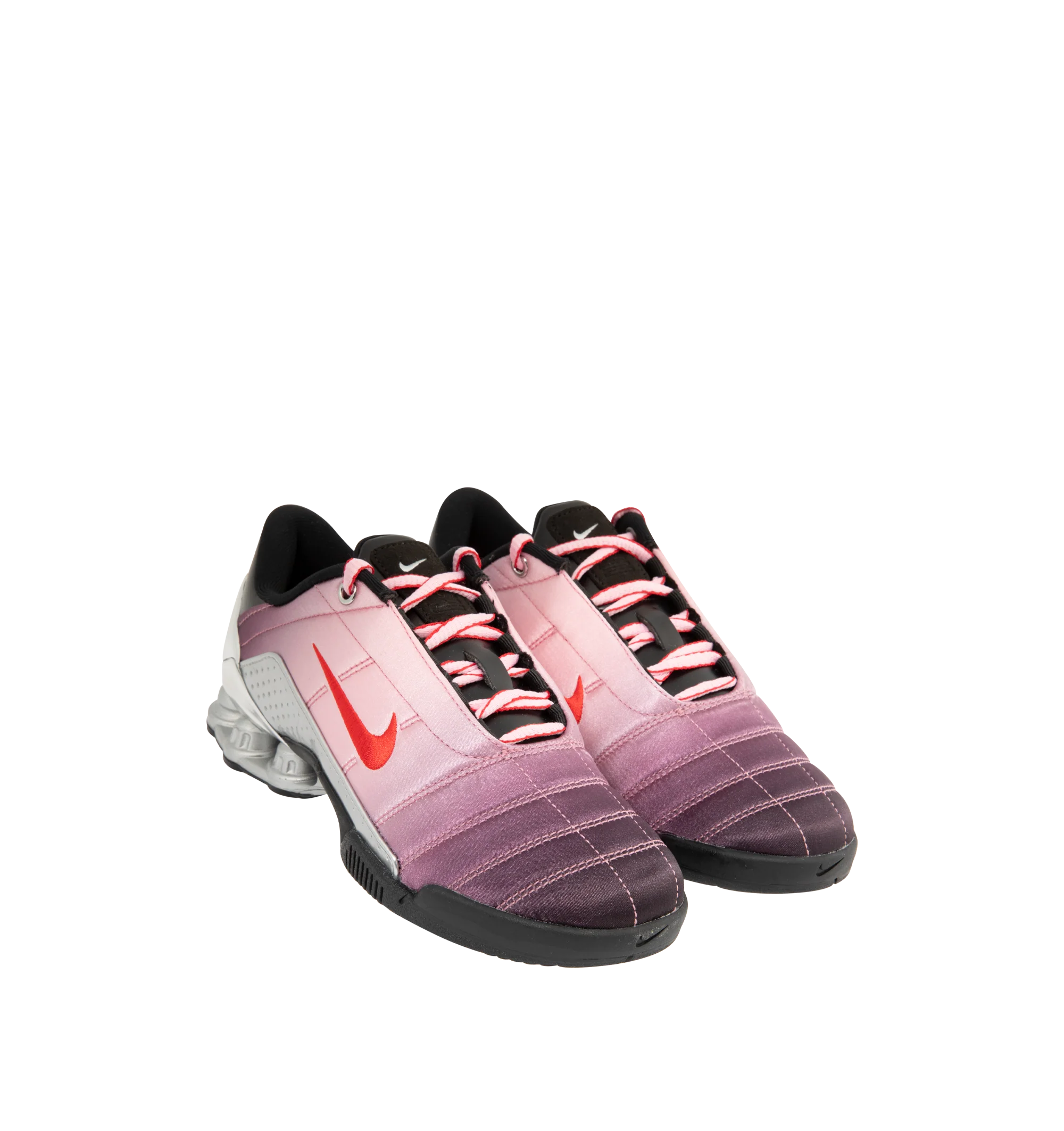 Image 2 of 5 - PINK - Nike Womens Shox Magia Sneakers feature a premium leather and textile upper. Designed with a lace-up closure, metallic accents, Nike Shox cushioning columns, and durable rubber outsole. Upper: Leather and Textile; Cushioning: Nike Shox; Outsole: Rubber. Imported