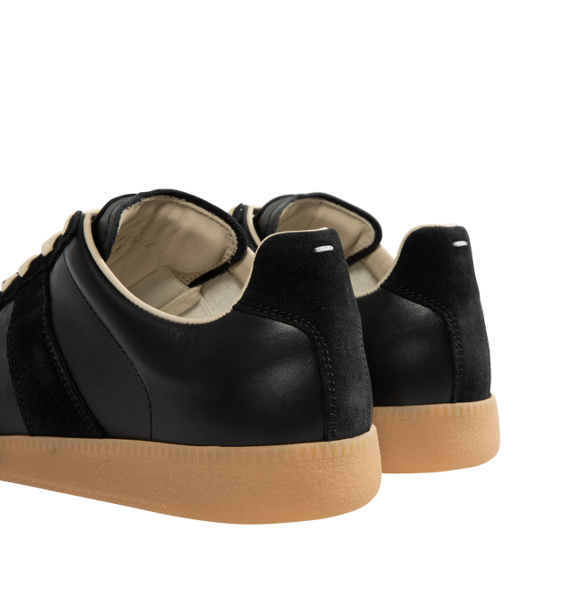 Image 3 of 5 - BLACK - MAISON MARGIELA High Quality Luxury Sneakers featuring a classic low-top silhouette, contrast of matte leather and a patent sprayed finish, paint splatter detail, lace-up construction and rubber sole. Made in Italy.