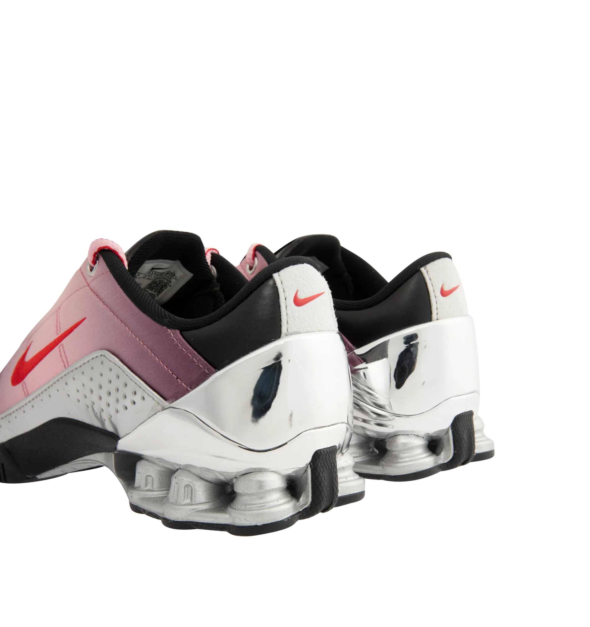Image 3 of 5 - PINK - Nike Womens Shox Magia Sneakers feature a premium leather and textile upper. Designed with a lace-up closure, metallic accents, Nike Shox cushioning columns, and durable rubber outsole. Upper: Leather and Textile; Cushioning: Nike Shox; Outsole: Rubber. Imported