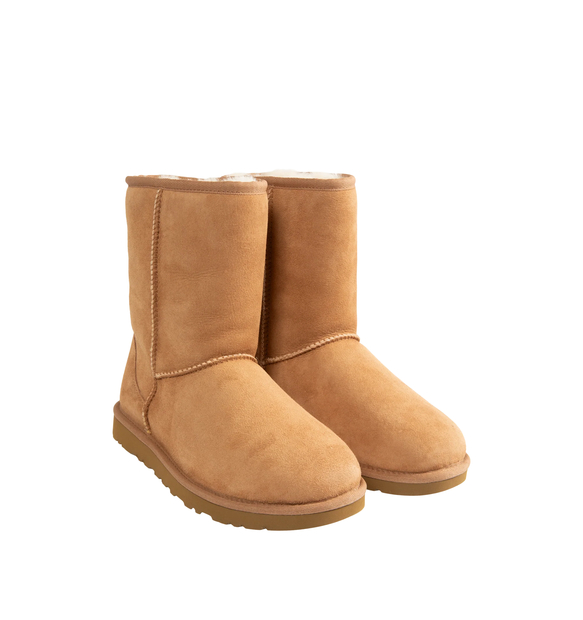 Image 2 of 4 - BROWN - UGG Men's Classic Short Boots are crafted from premium suede and feature the brand's iconic mid-calf silhouette with a soft sheepskin lining and cushioned footbed for signature warmth and comfort. These designer boots combine timeless style with lightweight cushioning and a durable outsole, making them an everyday cold-weather essential. Main Material: Suede. Lining: Sheepskin. Sole: Durable Rubber. 