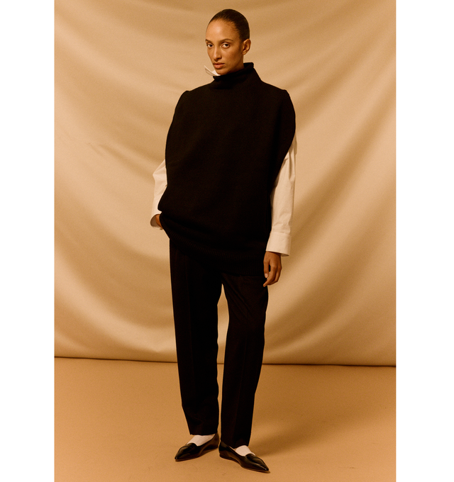 Image 3 of 5 - BLACK - The Row Richelle Pants are a mid-rise style with tapered legs, pressed front and back creases, and side seam pockets. 100% cashmere. Made in Italy.