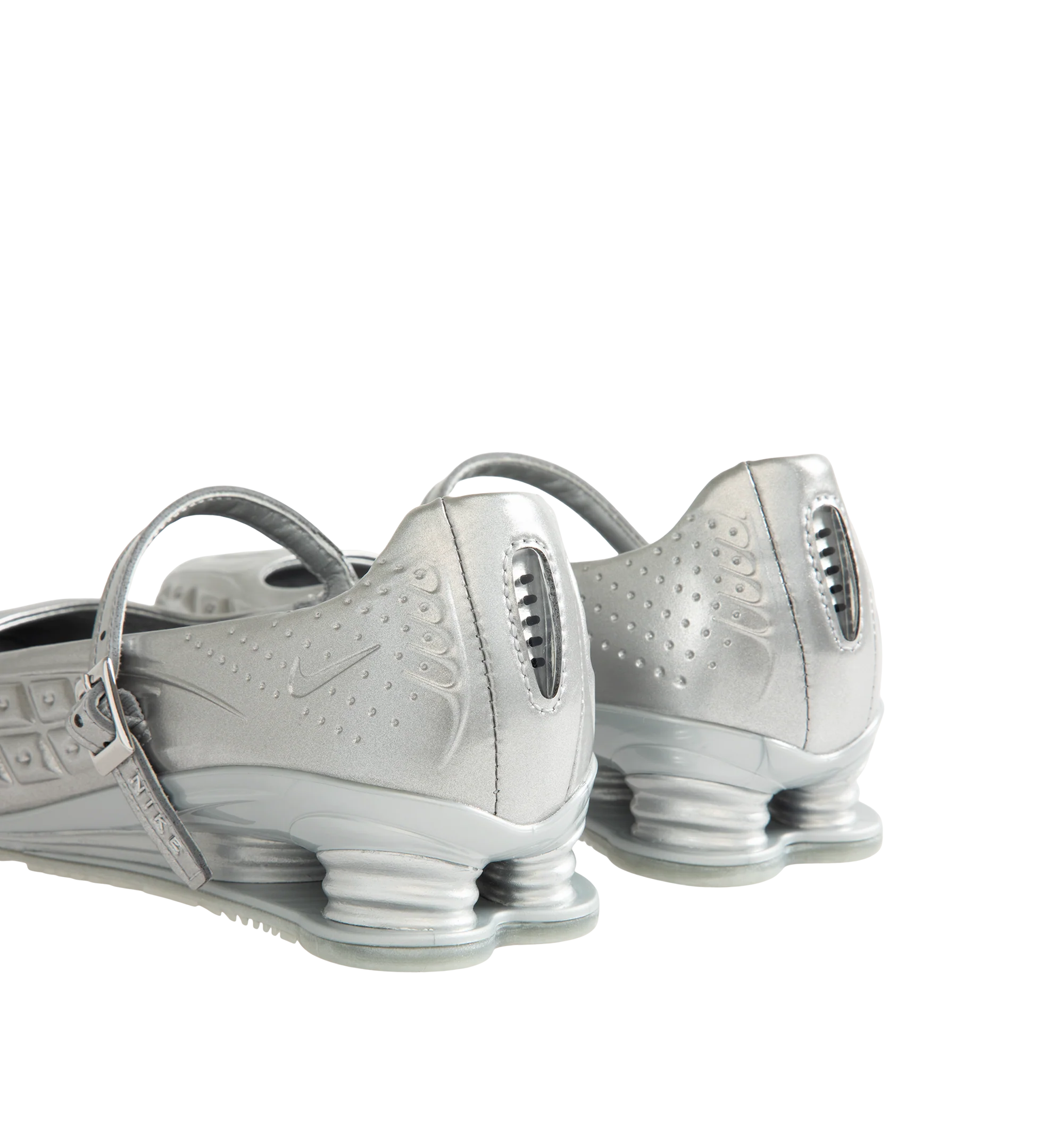 Image 3 of 5 - SILVER - Nike Womens Shox Z Calistra Shoe is a ballet-inspired flat on top of sleek sneaker-inspired heel cushioning. Designed with an adjustable midfoot strap, Nike Shox Z cushioning pillars, signature Nike and Shox branding, and durable rubber outsole. Upper: Synthetic Leather; Cushioning: Nike Shox Z; Outsole: Rubber. Imported