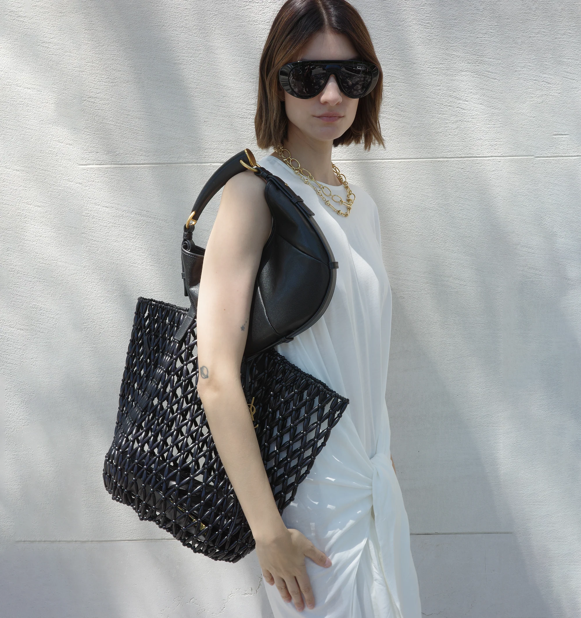 Image 2 of 4 - BLACK - SAINT LAURENT Beaded Shopping Bag featuring a distinct, unlined, and handcrafted design, two leather flat handles and a detachable leather keychain accessory. 35 cm x 29 cm x 25 cm. 100% wood beads. Made in Italy.   
