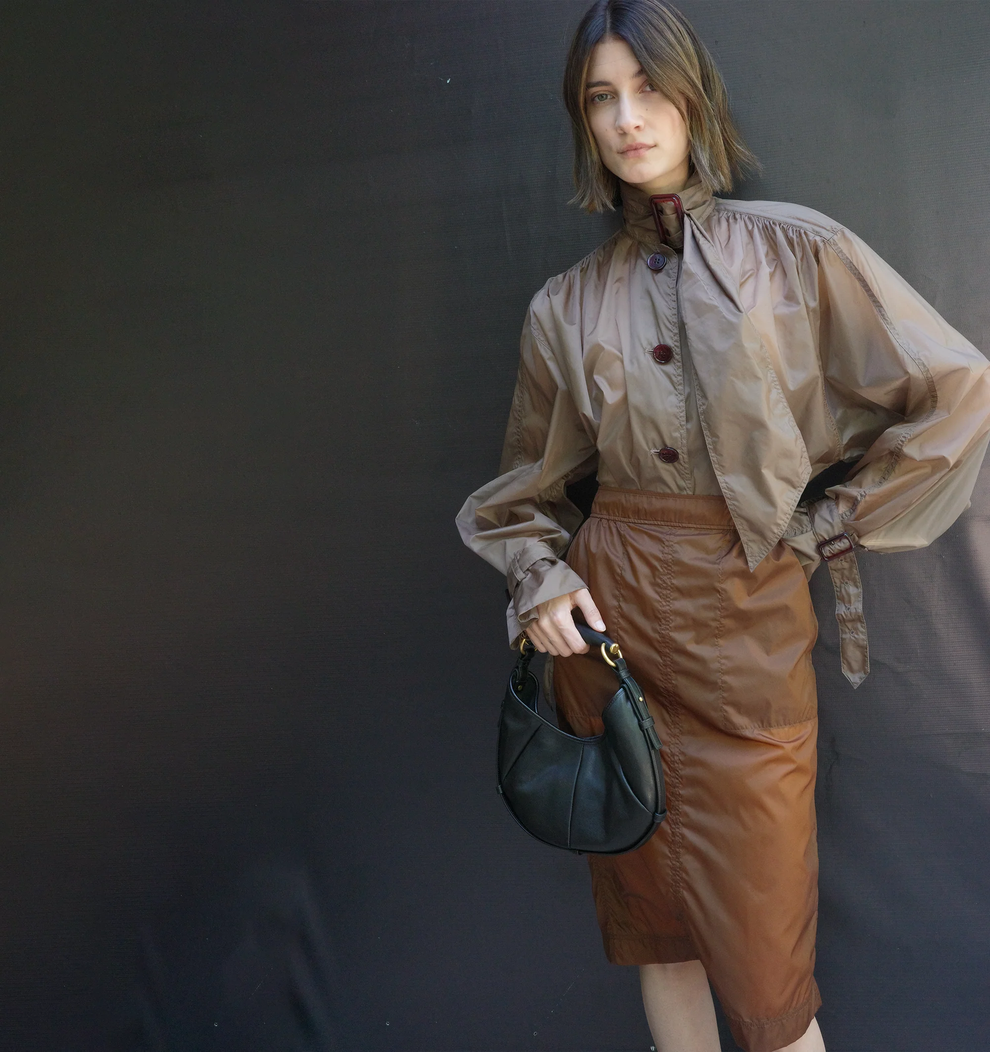 Image 2 of 3 - BROWN - SAINT LAURENT Nylon Pencil Skirt featuring semi-sheer pencil skirt, concealed back zip closure, two welt pockets at the front and single back vent. 100% polyamide. Made in Italy.
