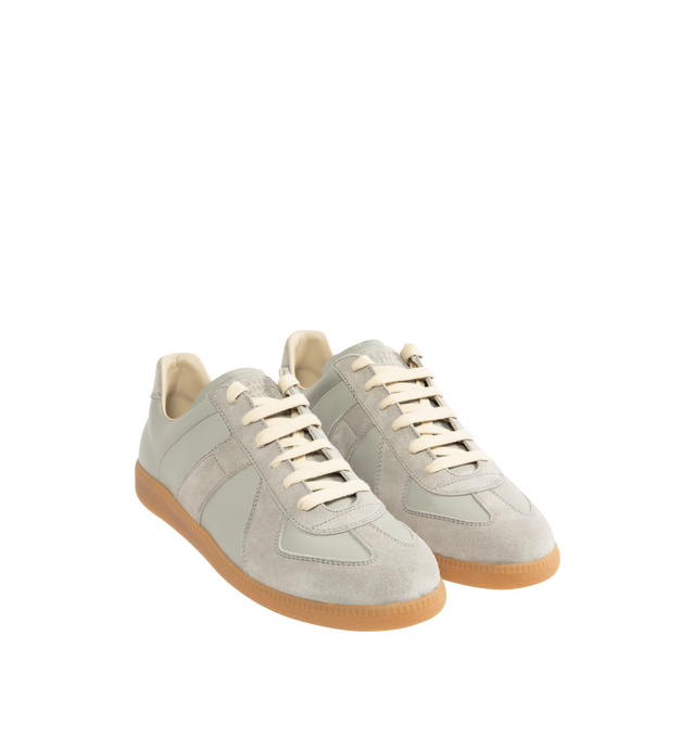 Image 2 of 5 - GREY - MAISON MARGIELA High Quality Luxury Sneakers featuring lace-up sneakers in buffed nappa calfskin and calfskin suede, contrasting sole, Maison Margiela logo label on the tab, internal High Quality Luxury label, internal elastic and all-over Maison Margiela logo insole. 100% calf leather. Sole: 100% rubber. Made in Italy.