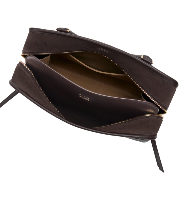 Image 12 of 16 - BROWN - LOEWE Large Amazona 180 Bag in suede featuring a relaxed silhouette anchored by a single toron top handle, designed to be carried open while a concealed closure secures the main compartment, removable shoulder and crossbody straps, zip closure with two leather zip pullers, two compartments, main compartment closed with magnetic closure, internal flat pocket, left side d-ring for customization, suede and nappa lambskin lining, embossed LOEWE and embossed double L branding. Suede/calf