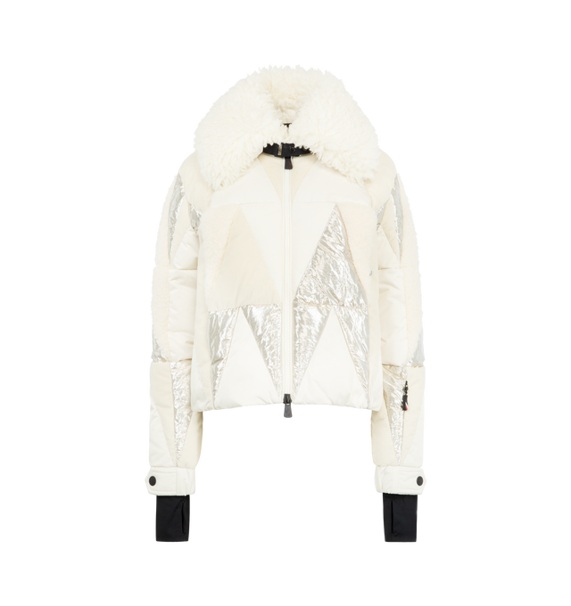 Image 1 of 3 - WHITE - MONCLER GRENOBLE Pamiers Patchwork Insulated Ski Jacket featuring teddy, polyester and metallic fabric intarsia, polyester lining, down-filled, wool blend collar, zipper closure, zipped pockets, inside media pocket with YKK AcquaGuard highly water resistant zipper closure, ski pass pocket with zipper closure, powder skirt, adjustable cuffs, hem with drawstring fastening and technical jersey wrist gaiters. 100% polyester. Collar: 90% virgin wool, 10% polyester. Padding: 90% down, 10% f