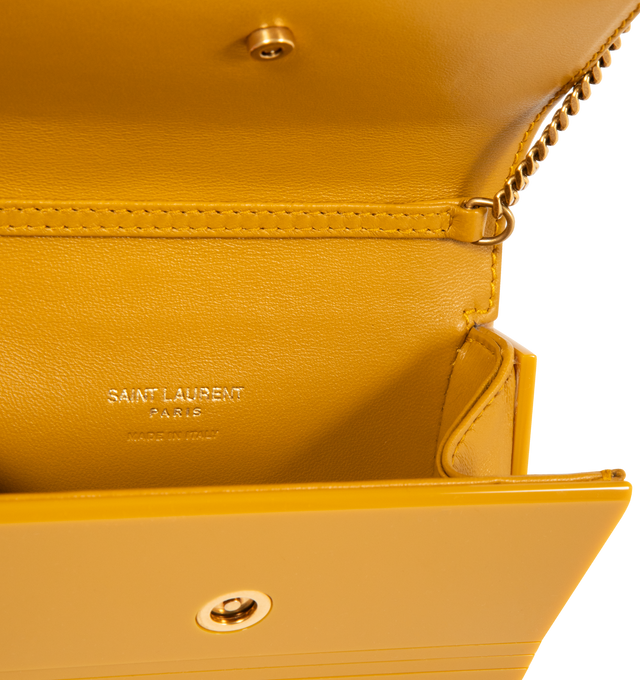 Image 3 of 3 - YELLOW - SAINT LAURENT Mini Vicky Plexiglass Bag featuring a front flap decorated with the iconic cassandre, a curb-chain strap for shoulder carry, leather lining, bronze-tone hardware and magnetic snap closure. Plexiglass. Made in Italy. 
