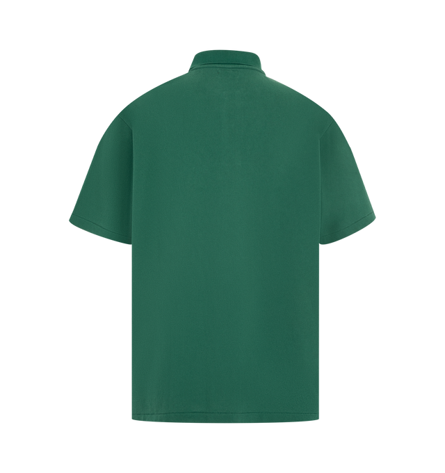 Image 2 of 2 - GREEN - HUMAN MADE Polo Shirt featuring a wide fit, single heart patch on the left chest, short sleeves, polo collar and shell-like buttons with the brand logo. 100% cotton. Made in Japan.
