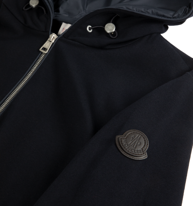 Image 2 of 2 - BLUE - MONCLER Cotton Blend Zip-Up Hoodie featuring cotton and nylon blend double jersey, hood, front and zipper lining in nylon, adjustable hood, zipper closure, side pockets, elastic cuffs and hem and double leather logo patch. 90% cotton, 10% polyamide/nylon. Made in Italy.