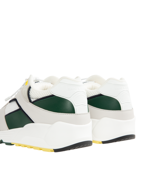 Image 3 of 5 - WHITE - SAINT LAURENT Bump Sneaker featuring low-top drawstring laced sneakers with a rubber SAINT LAURENT signature on the tongue and back tab. Calfskin, fabric. Made in Italy.