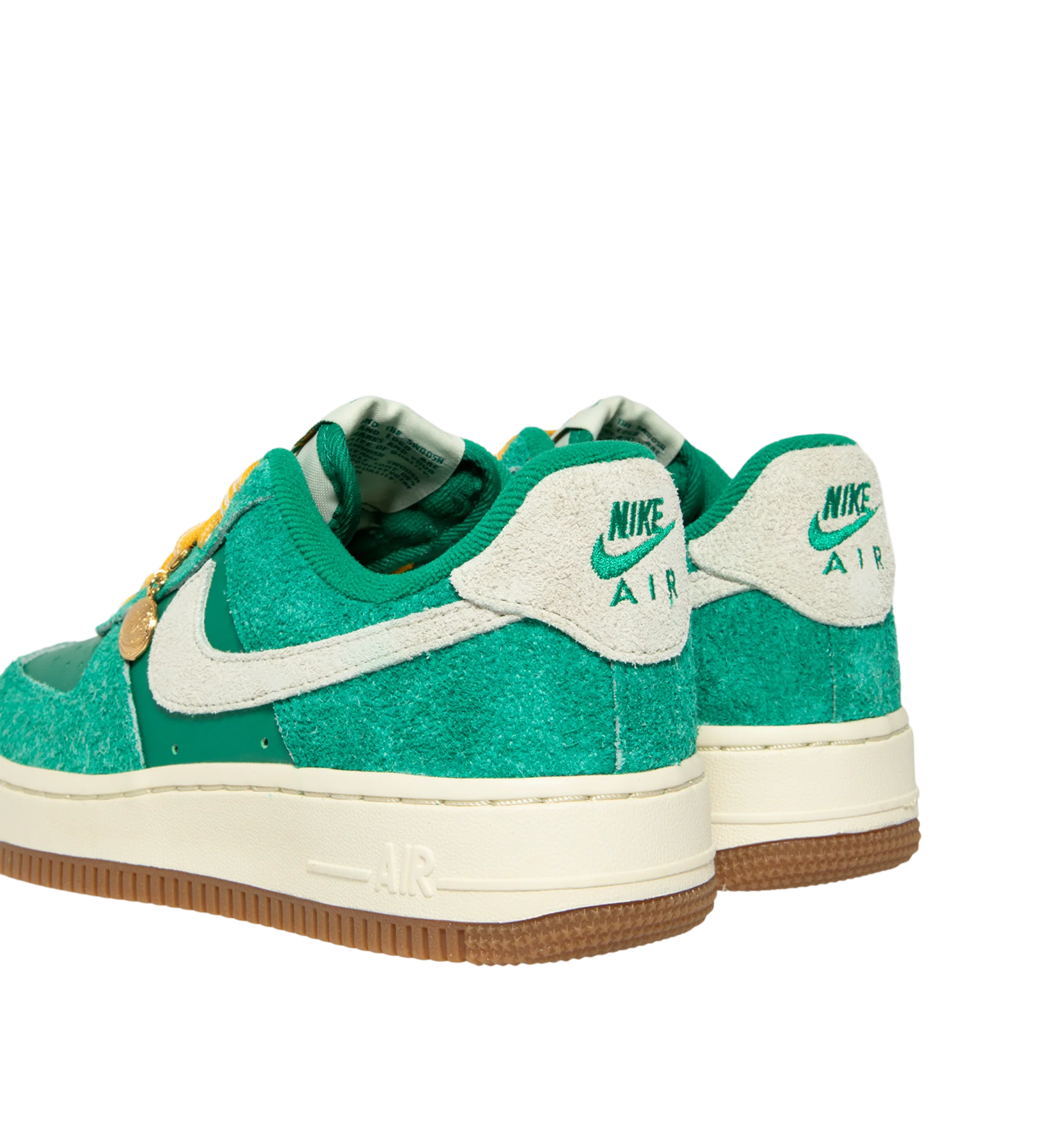 Image 3 of 5 - GREEN - Nike Women's Air Force 1 07' Game Day Sneakers feature a genuine and synthetic leather upper with a perforated toe box for breathable comfort and a timeless look. These iconic lifestyle sneakers combine lightweight Nike Air cushioning, a padded collar, and a durable rubber outsole with classic pivot-circle traction for everyday wear. Clip-on charms add a customizable finishing touch. Main Material: Genuine Leather and Synthetic Leather. Midsole: Foam with Nike Air Unit. Sole: Rubber.