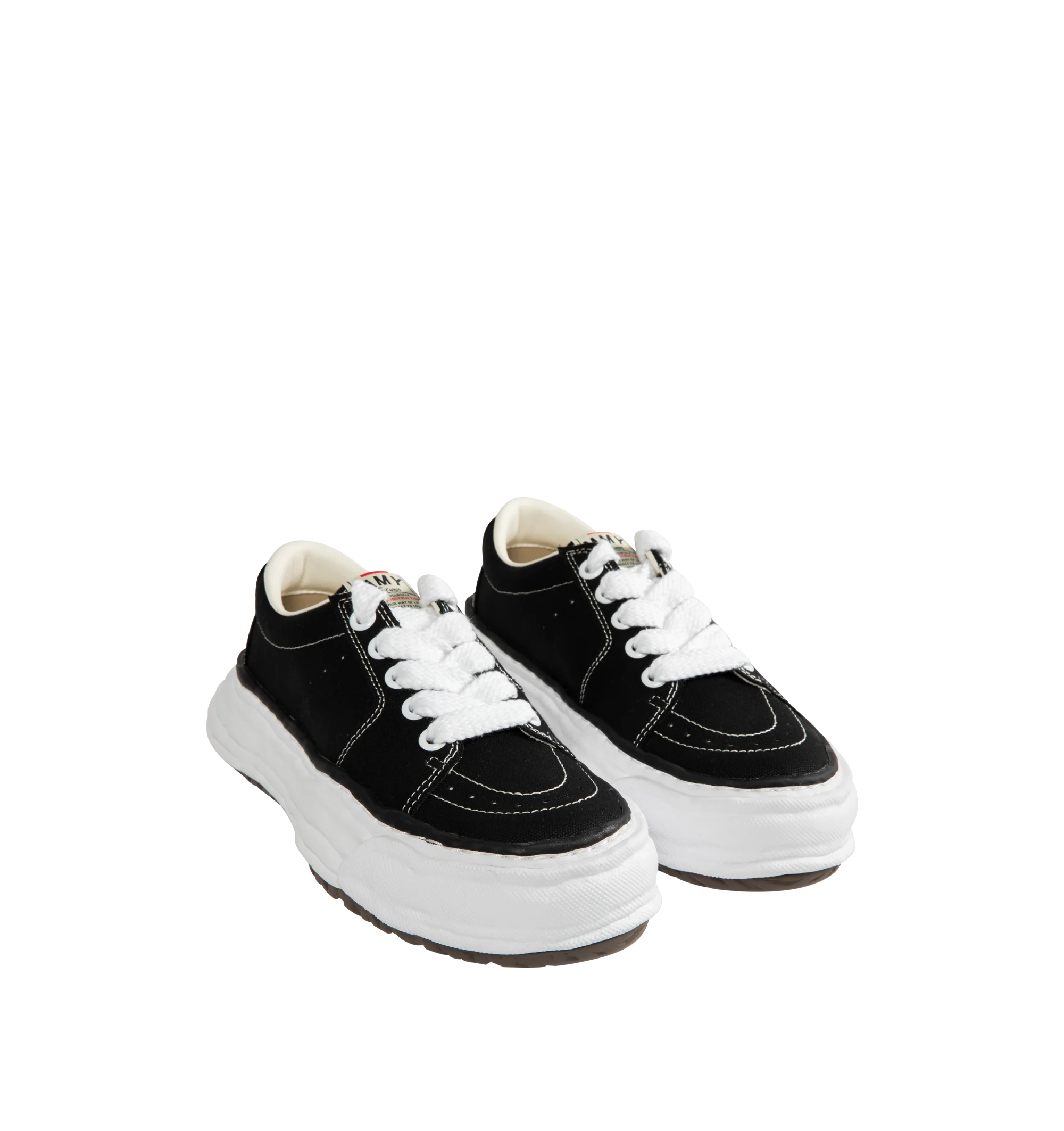 Image 2 of 5 - BLACK - Maison Mihara Yasuhiro Men's Eric Sneakers feature the brand's signature hand-sculpted OG sole, a mixed-material suede and canvas upper, and distinctive toe stitching for a bold contemporary look. Designed for the Spring/Summer 2026 collection, these designer low-top sneakers combine Maison Mihara Yasuhiro's experimental aesthetic with everyday comfort, while the handcrafted-inspired sole and intentional vintage detailing create a truly distinctive silhouette. Main Material: Cow Leath