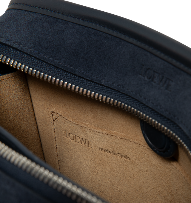 Image 5 of 5 - NAVY - LOEWE Small Amazona 180 Bag in suede featuring a relaxed silhouette anchored by a single toron top handle, designed to be carried open, while a concealed closure secures the main compartment, three carry options: short handle, removable shoulder strap and crossbody, zip closure with two leather zip pullers, two compartments, main compartment closed with magnetic closure, internal flat pocket, left side d-ring for customization, suede and nappa lambskin lining, embossed LOEWE and emboss 