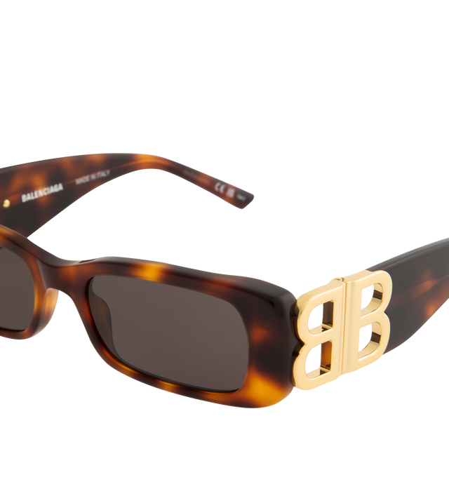 Image 3 of 3 - BROWN - BALENCIAGA Dynasty Rectangle Sunglasses featuring full acetate frame and temples, rectangle shape, standard fit, hidden hinges within the shiny gold BB logo and lasered logo on the right lens. Lens category: 3. 100% UVA/UVB protection. Made in Italy.