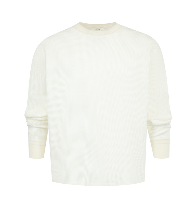 Image 1 of 2 - WHITE - THE ROW Masaki T-Shirt featuring long-sleeved crewneck top in waffled jersey with regular fit and ribbed neckline and cuffs. 100% cotton. Made in Italy.