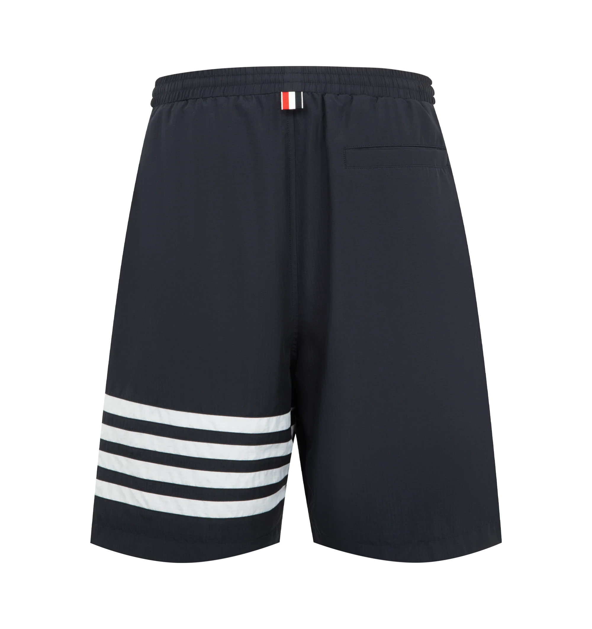 Image 2 of 3 - BLUE - Thom Browne Mens Track Shorts are crafted from shiny ripstop fabric. Feature a relaxed fit, elasticized drawstring waistband with signature RWB aglets, zip fly, welt hand pockets, welt back pocket, mesh lining, engineered 4-bar detailing, and signature striped grosgrain loop tab. Main Material: 81% Polyamide, 19% Polyester; Lining: 100% Polyester. Made in Italy.