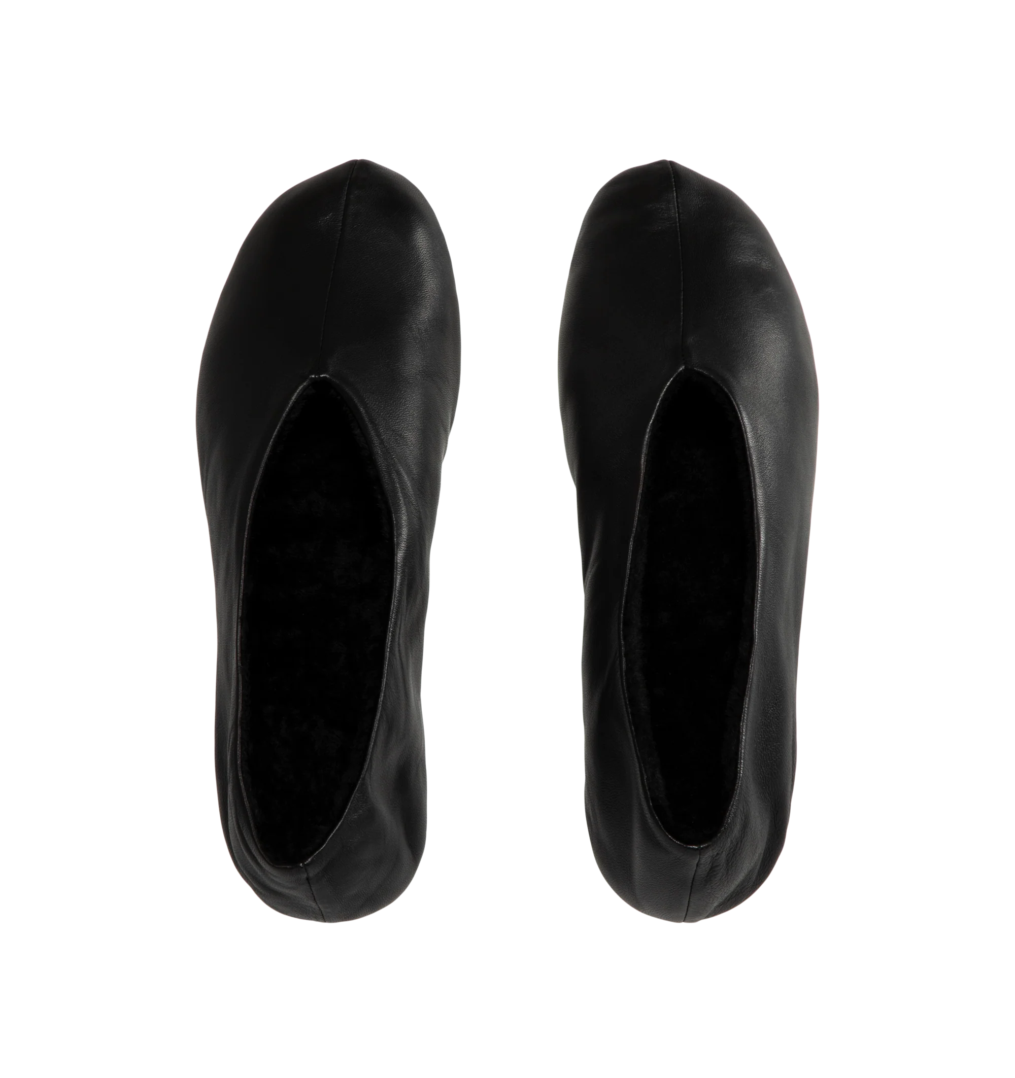 Image 4 of 4 - BLACK - The Row Women's Stella Slippers are crafted from smooth nappa lambskin leather and feature a slip-on silhouette with an oval toe, soft shearling lining, and a flexible rubber-coated sole. These designer leather slippers combine exceptional Italian craftsmanship with luxurious comfort, making them an elevated choice for effortless everyday wear. Main Material: 100% Lambskin Leather. Lining: Shearling. Sole: Rubber-Coated. Made in Italy.