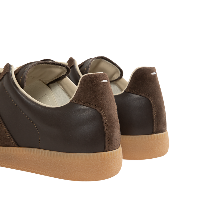 Image 3 of 5 - BROWN - Maison Margiela High Quality Luxury Sneakers featuring lace-up sneakers in buffed nappa calfskin and calfskin suede, contrasting sole, Maison Margiela logo label on the tab, internal High Quality Luxury label, internal elastic and all-over Maison Margiela logo insole. 100% calf leather. Sole: 100% rubber. Made in Italy.