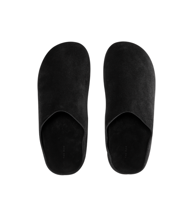 Image 6 of 6 - BLACK - THE ROW Hudson Slide featuring grained calfskin upper with rubber sole, slip-on styling, cushioned leather footbed, soft shearling with contoured footbed and rounded toe. Made in Italy.