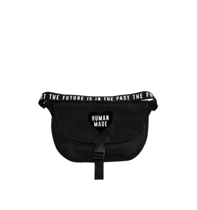 Image 1 of 4 - BLACK - HUMAN MADE Shoulder Bag featuring shoulder bag with a buckle belt, lightweight and durable nylon Oxford fabric, PVC heart logo on the front, shoulder strap with logo, zip pocket on the back, two pockets provide storage for small items and A4-sized storage. 100% nylon.