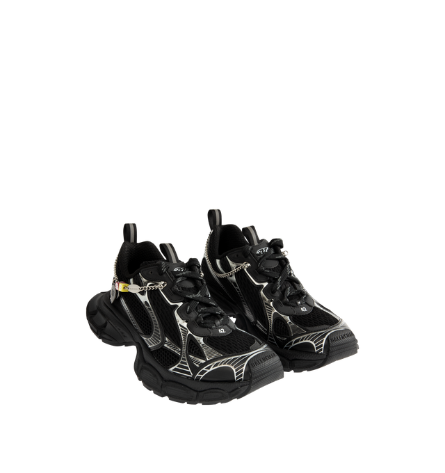 Image 2 of 5 - BLACK - BALENCIAGA 3XL Sneaker featuring polyurethane and polyester, worn-out effect, aged-silver chain with charms on the upper, Balenciaga logo at the edge of the toe and at back, debossed size on the upper and at the back of the heel, 3XL rubber branding on the tongue and back and tongue pull-on tab with reflective detail. Upper: polyurethane, polyester. Sole: rubber, EVA. Insole: foam.