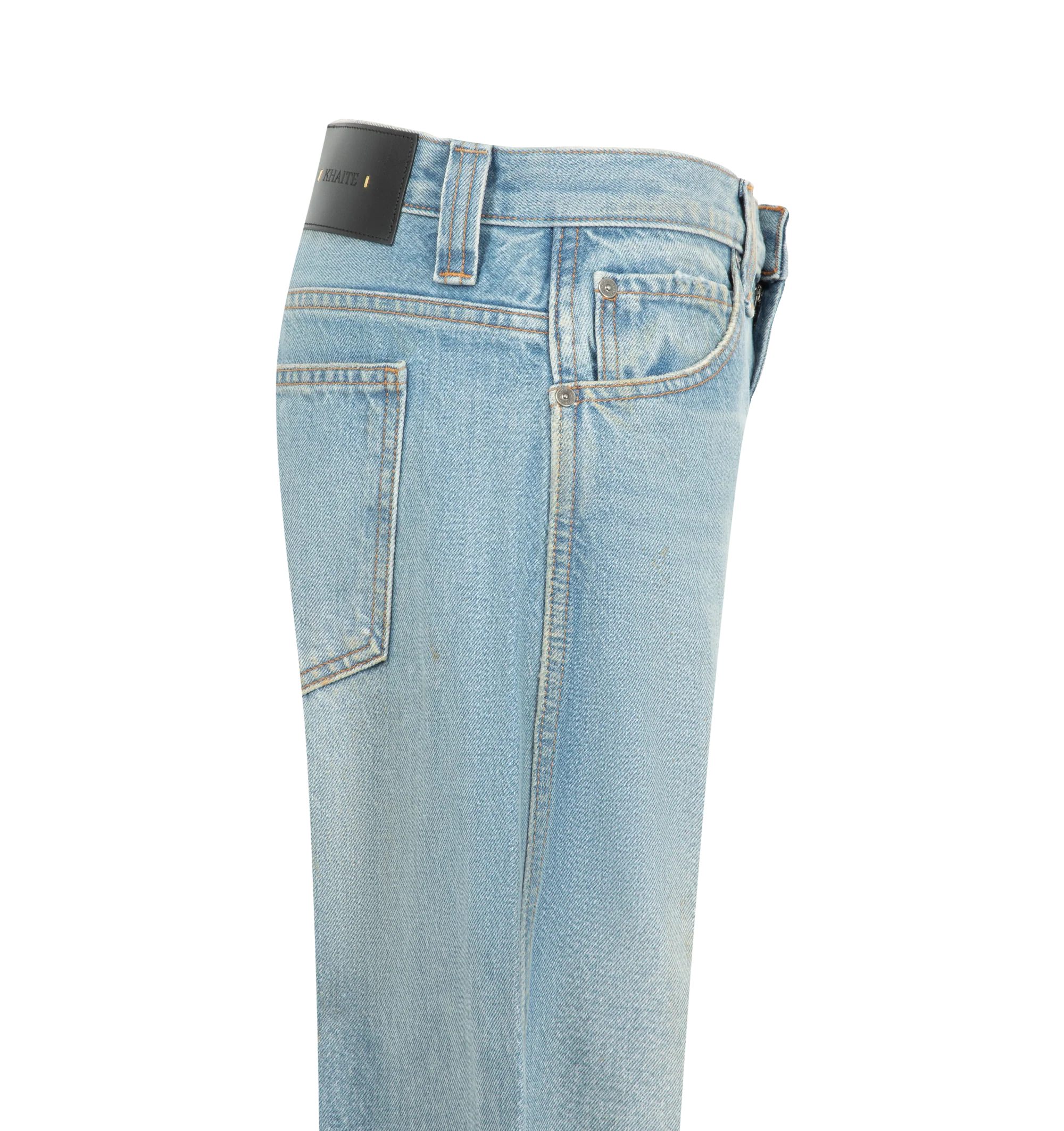 Image 3 of 3 - BLUE - Khaite Women's Karo Jean is crafted from rigid cotton denim and features a low-rise silhouette designed to sit low on the hips, detailed with curved seams that create a bowed leg shape, cuffed hems, classic five-pocket styling, and an antiqued nickel embossed button closure. Main Material: 100% Cotton. Made in USA. 