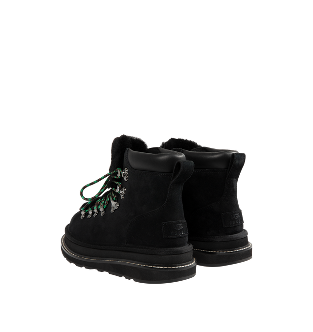 Image 3 of 4 - BLACK - UGG x sacai hiker boots designed for everyday wear, combines UGG's iconic premium suede with sacai's unmistakable hybridized aesthetic. Upper is made with suede sourced from certified farms that practice regenerative agriculture upper. Midsole incorporates sugarcane EVA. Features Vibram XS Trek Evo. Unisex style in women's sizes.