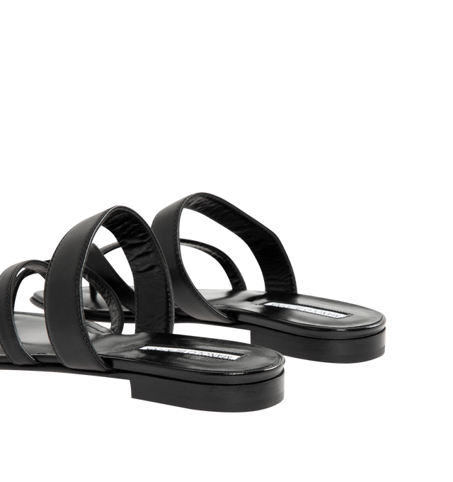 Image 3 of 4 - BLACK - MANOLO BLAHNIK Susa Leather Crossover Flat Sandals featuring nappa leather open toe sandals with crossover straps and flat stacked heel. Upper: 100% lamb nappa. Sole: 100% calf leather. Lining: 100% kid leather. Heel measures 10 mm. Made in Italy. 