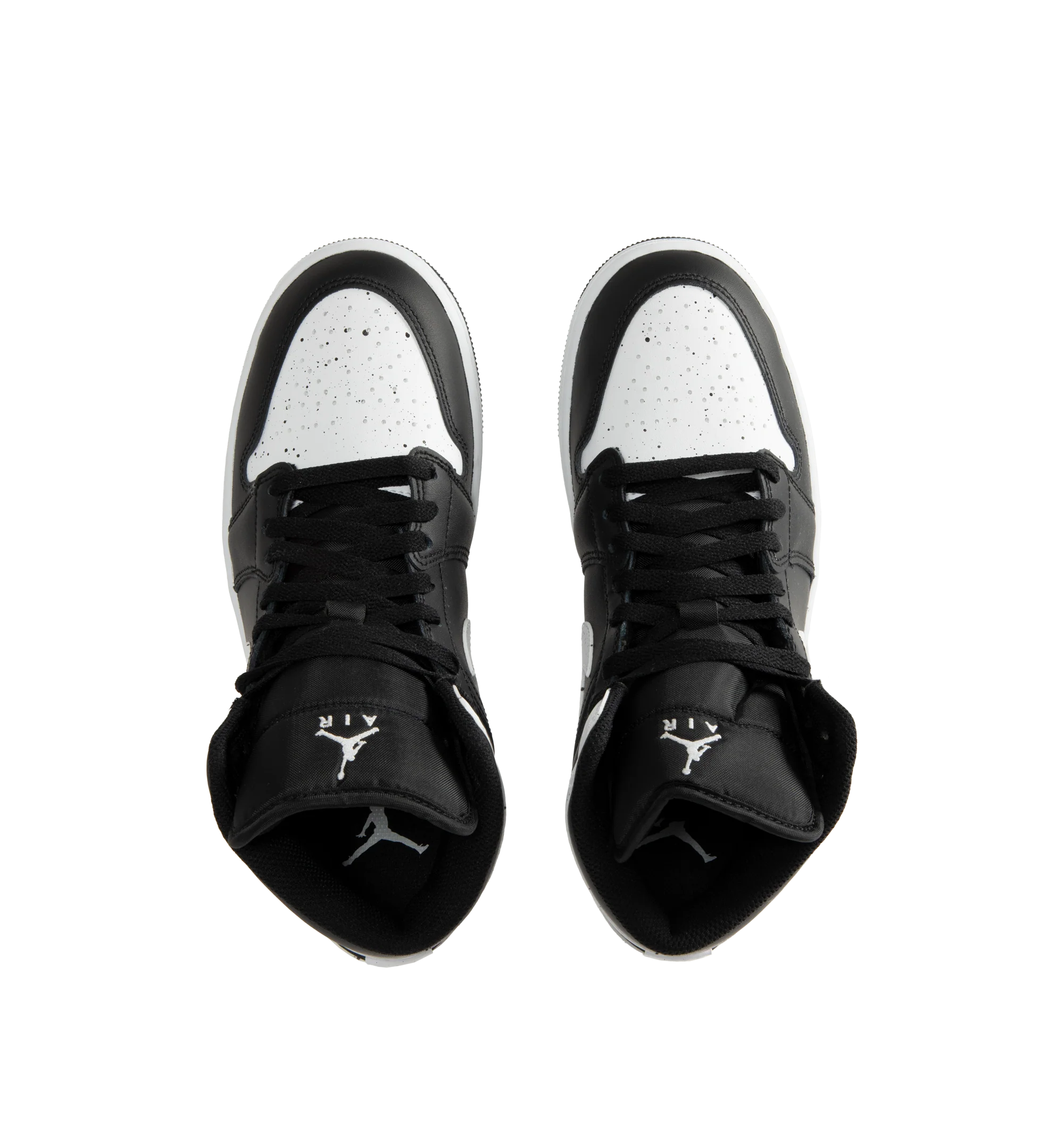 Image 5 of 5 - MULTI - Jordan Men's Air Jordan 1 Mid SE Sneakers feature a black and white upper crafted from genuine leather and textile. The mid-top silhouette is accented with a Wings logo at the collar and a Jumpman logo on the tongue, while an encapsulated Nike Air-Sole unit provides lightweight cushioning. Upper: Genuine Leather and Textile. Sole: Rubber.