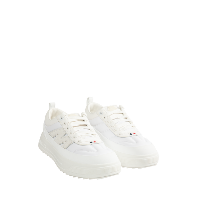 Image 2 of 5 - WHITE - Moncler Mens Altive Sneakers feature a nylon, nubuck, and suede upper. Designed with a lace-up closure, leather lining, OrthoLite insole, foam padding, EVA midsole, TPU spoiler, and Vibram rubber tread. Upper: Cow Leather and 100% Polyamide/Nylon; Lining: Cow Leather and 100% Polyamide/Nylon; Sole: 100% Elastodiene. Sole Height: 4.2 cm. Made in Vietnam. 