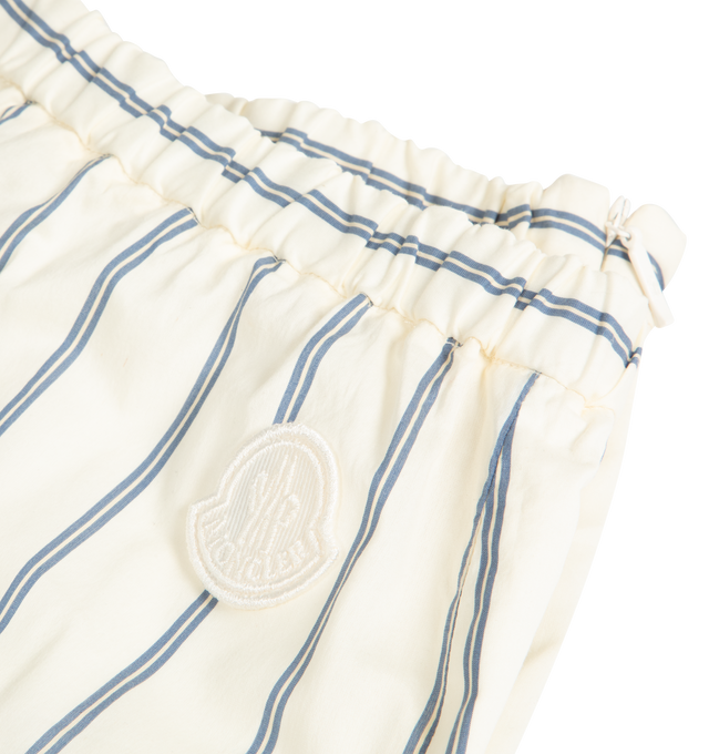Image 2 of 2 - WHITE - MONCLER Striped Cotton  Silk Pants featuring striped cotton and silk blend voile, invisible zipper closure, seam pockets, elasticized waistband and logo patch. 80% cotton, 20% silk. 