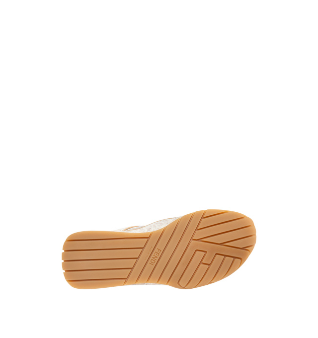 Image 4 of 5 - NEUTRAL - FENDI Wave Pulse Sneaker featuring low-tops, lace-up, made of technical fabric with a white graphic print an beige suede inserts, cavallino calfskin fold-over tongue and heel counter, three-dimensional rubber logo on the side, gold metal Fendi logo on the tongue, rubber running sole with wraparound edge on the side and diagonal F motif. 100% calfskin, 100% polyamide, inside: 100% lamb leather. Made in Italy.