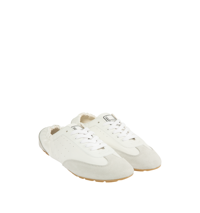 Image 2 of 5 - WHITE - SAINT LAURENT Lewis Sneakers in leather and suede featuring low-top, laced closure, an elasticized heel counter, supple sole and SAINT LAURENT signature patch at the back. Lambskin, calfskin. Made in Italy.