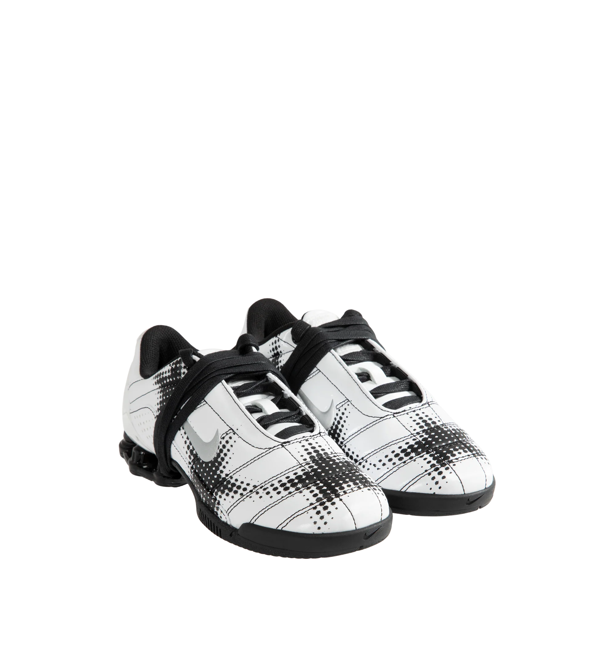 Image 2 of 5 - WHITE - Nike Women's Total 90 Shox Magia Sneakers feature a premium nubuck leather upper with oversized laces and printed graphic detailing, combining the iconic design of the Total 90 with a sleek, tonal finish. Inspired by early-2000s soccer style, these lifestyle sneakers pair signature Nike Shox cushioning with a durable rubber outsole for responsive comfort and everyday wear. Main Material: Nubuck Leather. Midsole: Nike Shox. Sole: Rubber.  