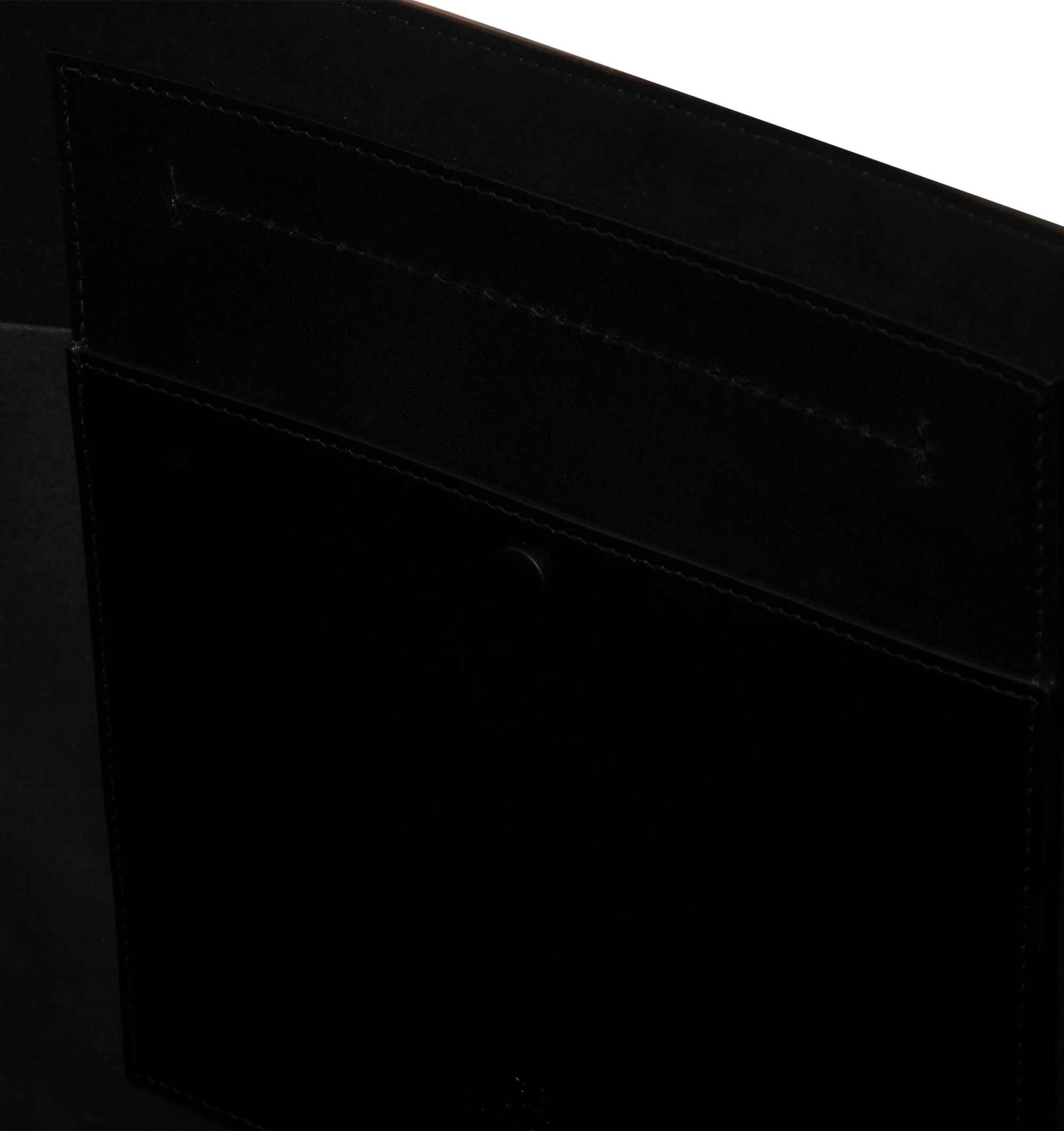 Image 3 of 3 - BLACK - Moncler Men's Carlo Leather Tote Bag is crafted from supple calf leather and features a spacious, clean-lined silhouette designed for versatile everyday use. Finished with adjustable leather handles, an interior pocket with snap-button closure, embossed and metal Moncler logo details, and a stretch polyester-blend lining, this designer tote combines refined craftsmanship with practical organization. Leather Exterior: Cow Leather. Lining: 91% Polyester, 9% Elastane/Spandex. Dimensions: