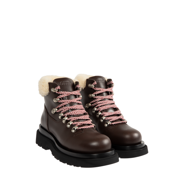 Image 2 of 4 - BROWN - BOTTEGA VENETA Lug Hiking Ankle Boot featuring lace-up hiking ankle boot crafted from calfskin leather, a merino shearling collar and micro rubber outsole. Calfskin, lambskin. Made in Italy.  