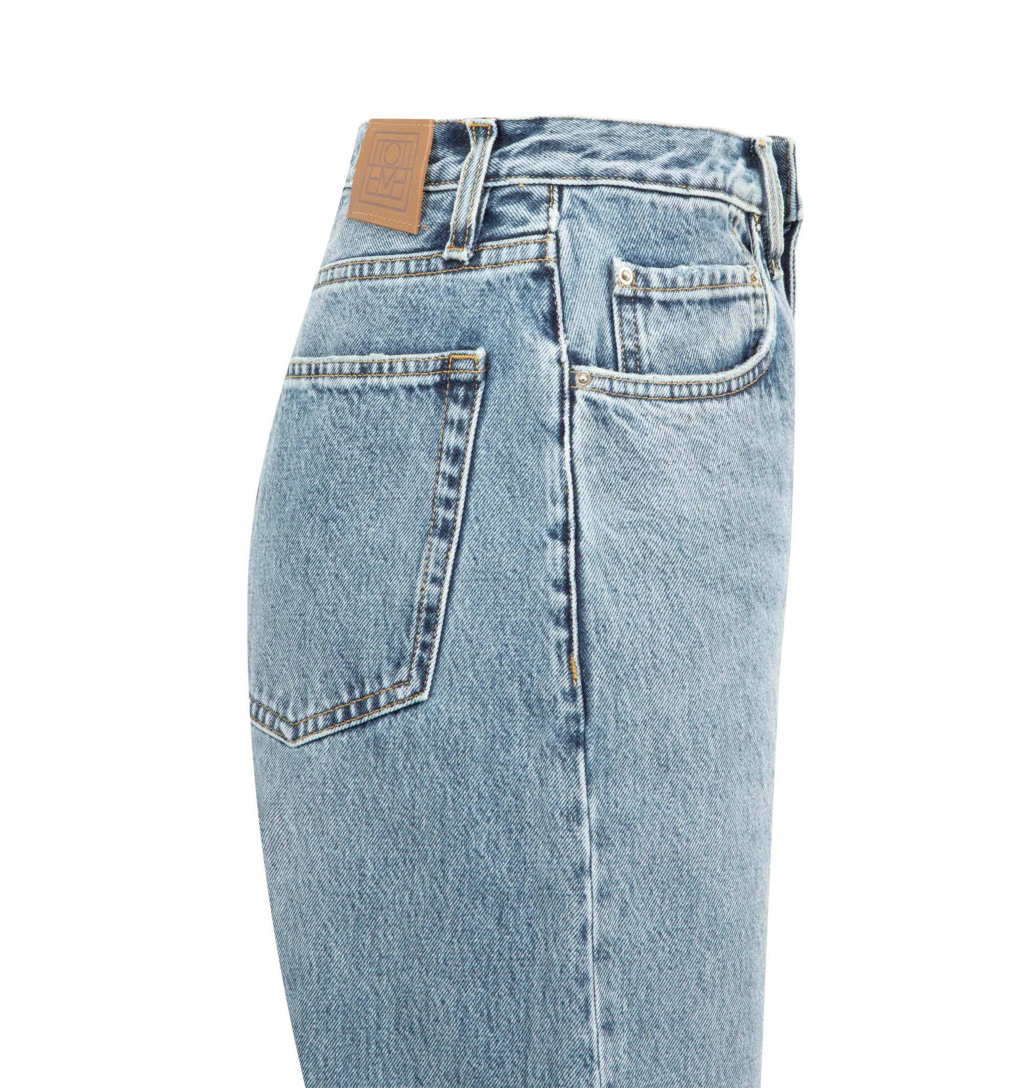 Image 3 of 3 - BLUE - TOTEME Twisted Seam Denim full length featuring relaxed fit, straight-leg, a dropped rise, constructed with directional side seams, button fly, silver-tone hardware, five pockets, belt loops, finished hem and leather patch. 100% organic cotton.