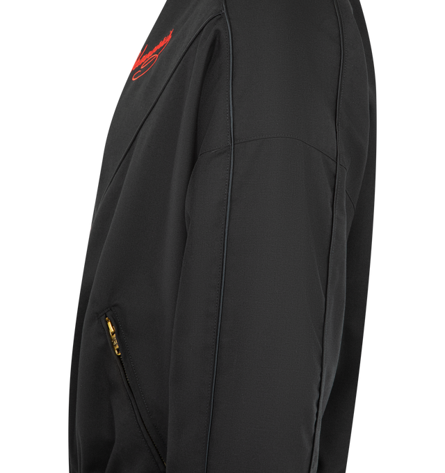 Image 5 of 5 - BLACK - WILLY CHAVARRIA Ruff Ryder Jacket featuring a nylon taffeta piped throughout, full lining, script inspired logo, stand collar, zip closure, zip pockets and elasticated trims. 100% nylon. Made in the USA.