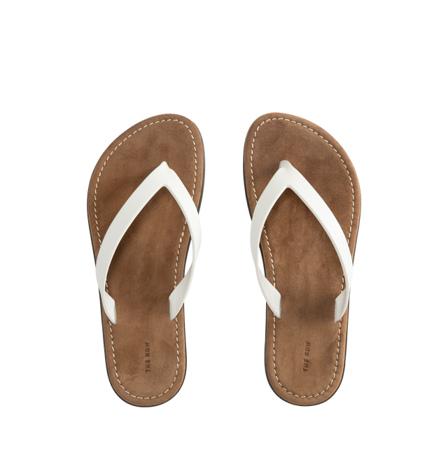 Image 4 of 4 - WHITE - THE ROW Beach Flip Flop featuring vegetable-tanned calfskin leather with seamless strap, padded goatskin insole and rubber sole. 100% calfskin leather. Synthetic sole. Made in Italy.